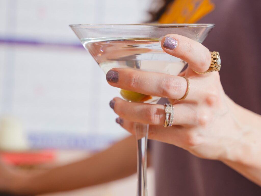 Up-close brand photo of Cassie's drink in hand.